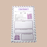 Purple book review notepad